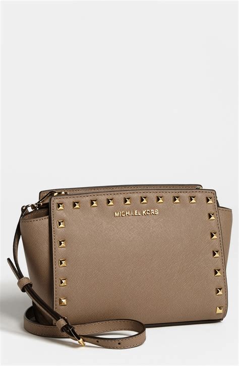 michael kors selma studded saffiano clutch|Michael Kors selma crossbody bag.